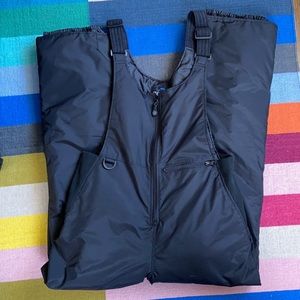 Black ski or snow bib overalls, size L